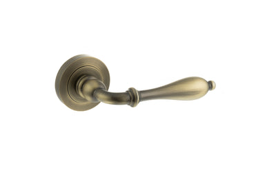 Old English Wrexham Lever Door Handle on Round Rose